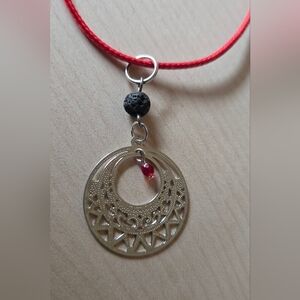 Elegant Silvertone Pendant Aromatherapy Necklace with Red Accents
